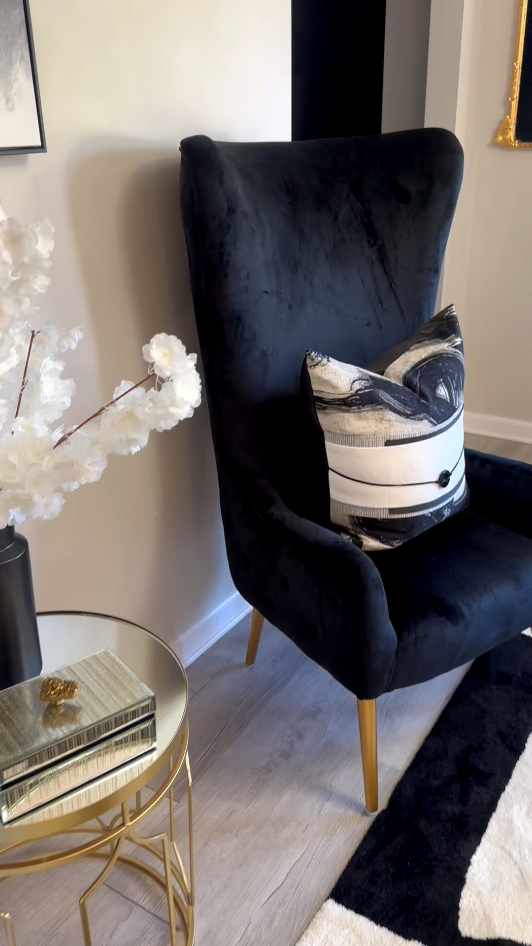 Black velvet wingback chair! Fabulous and comfortable .