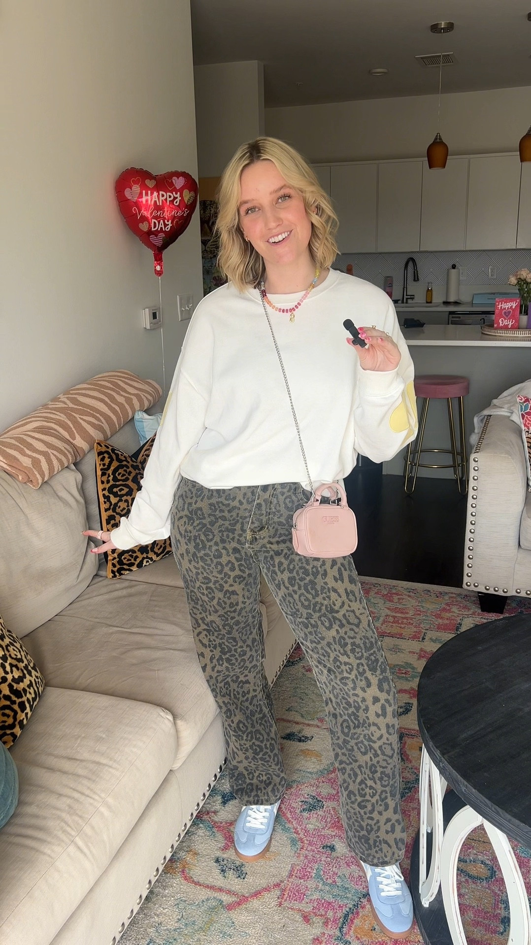affordable outfit breakdown! blue sneakers are just fab / yellow heart sweatshirt from tjmaxx / leopard jeans and colorful initial necklace from amazon / pink micro purse from guess

#LTKSaleAlert #LTKFindsUnder50 #LTKStyleTip