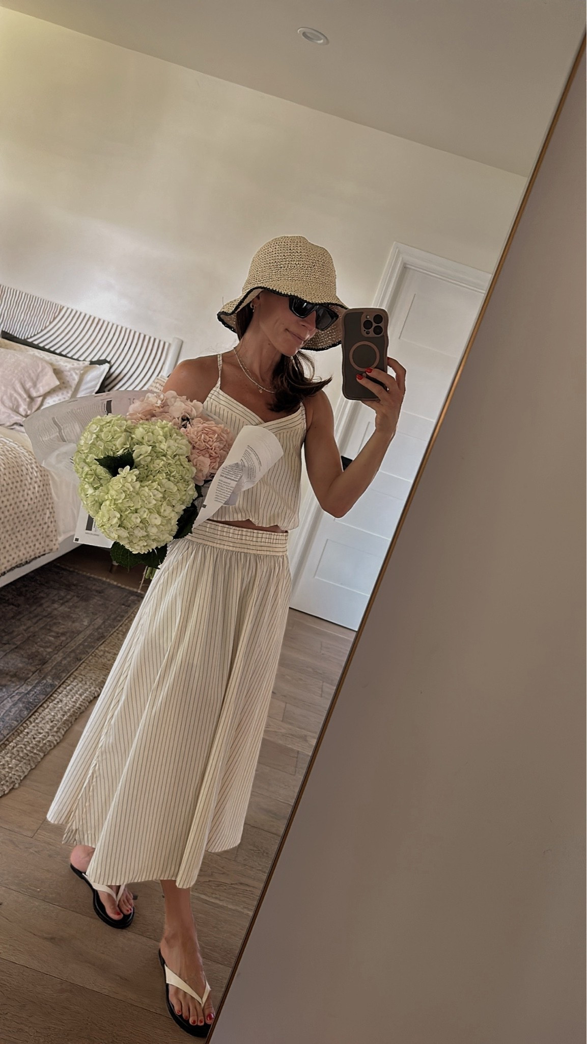 Even though we’re back into school and routines over here, summer still has a month to go… and that month tends to be the warmest. So I’m still reaching for lightweight pieces that I can easily mix and match like this beautiful striped woven bubble cami and midi skirt  combo from  @caliafitness summer collection. Both pieces are perfect for hot summer days, since they’re lightweight and airy. #caliapartner

#LTKOver40