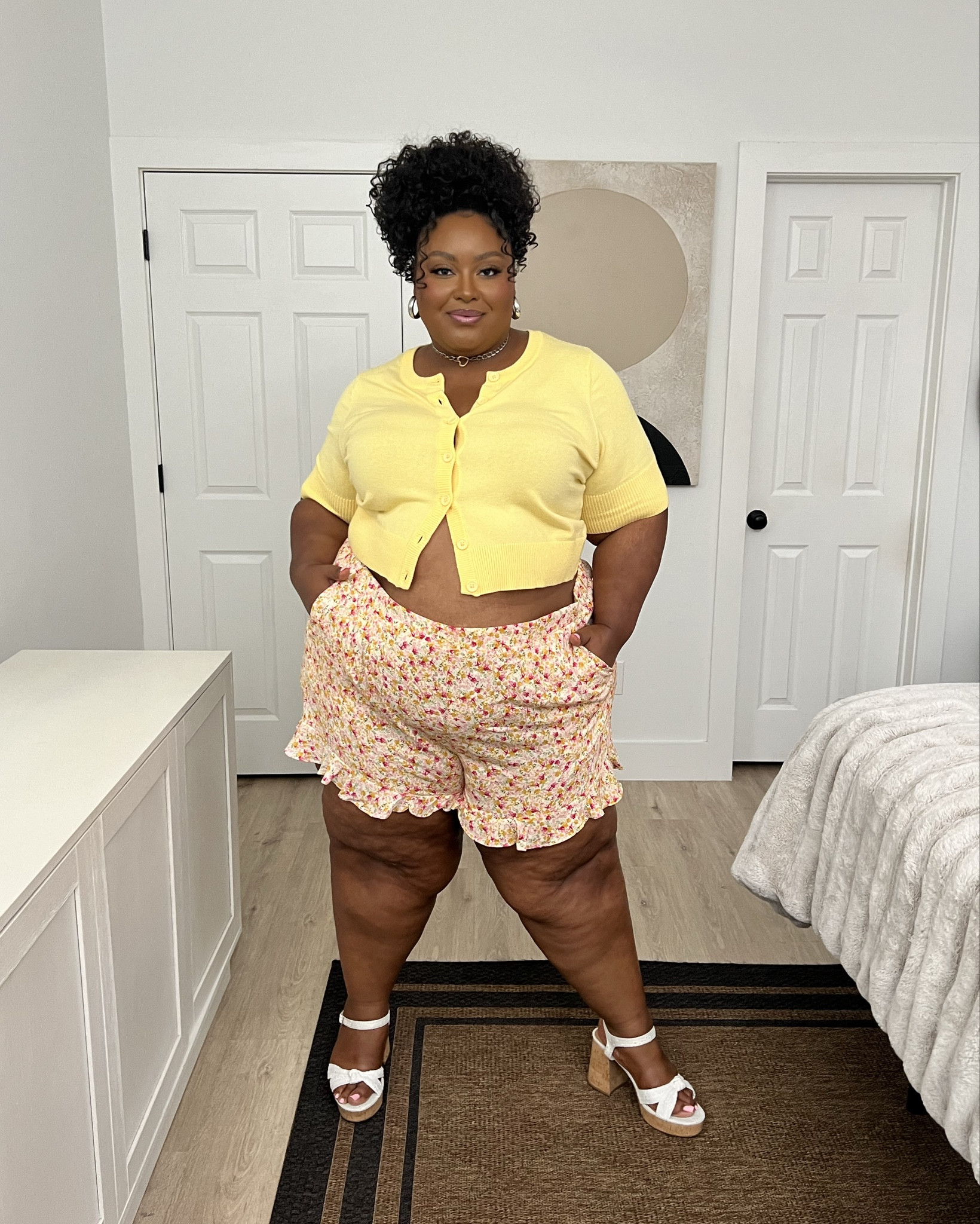 I feel so flirty in this floral yellow look! The  Flowy ruffle hem on these shorts adds an extra touch of playfulness.
The cropped cardigan can be worn open or closed, but I styled it open for a sprinkle of heat.

These heels are super comfortable and extra wide width!

Available in sizes 10-30



#LTKPlusSize #LTKMidsize #LTKStyleTip