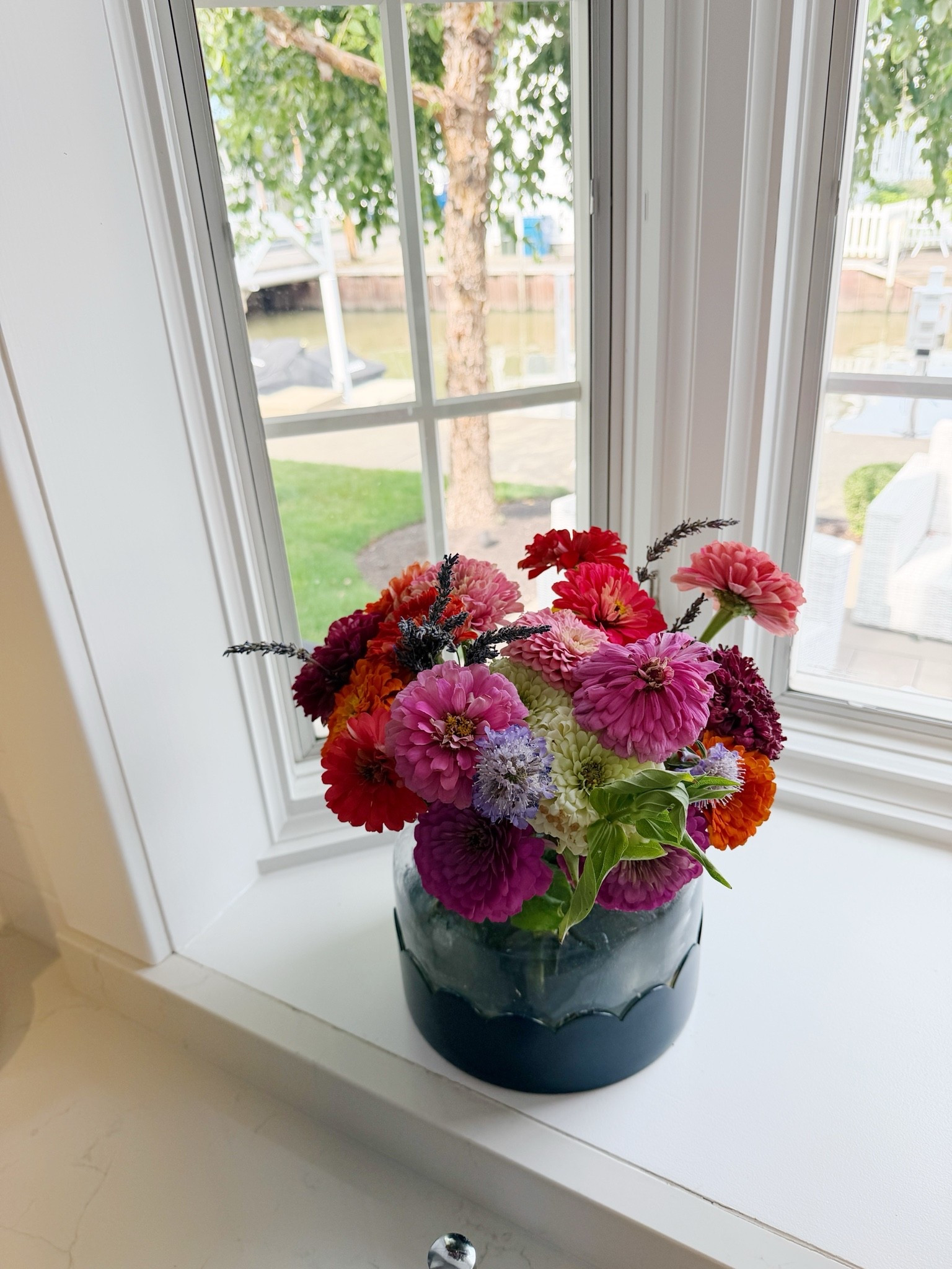 Two-in-one scalloped bloom vase in white and navy. A favorite at our lake house! Also great for a gift!