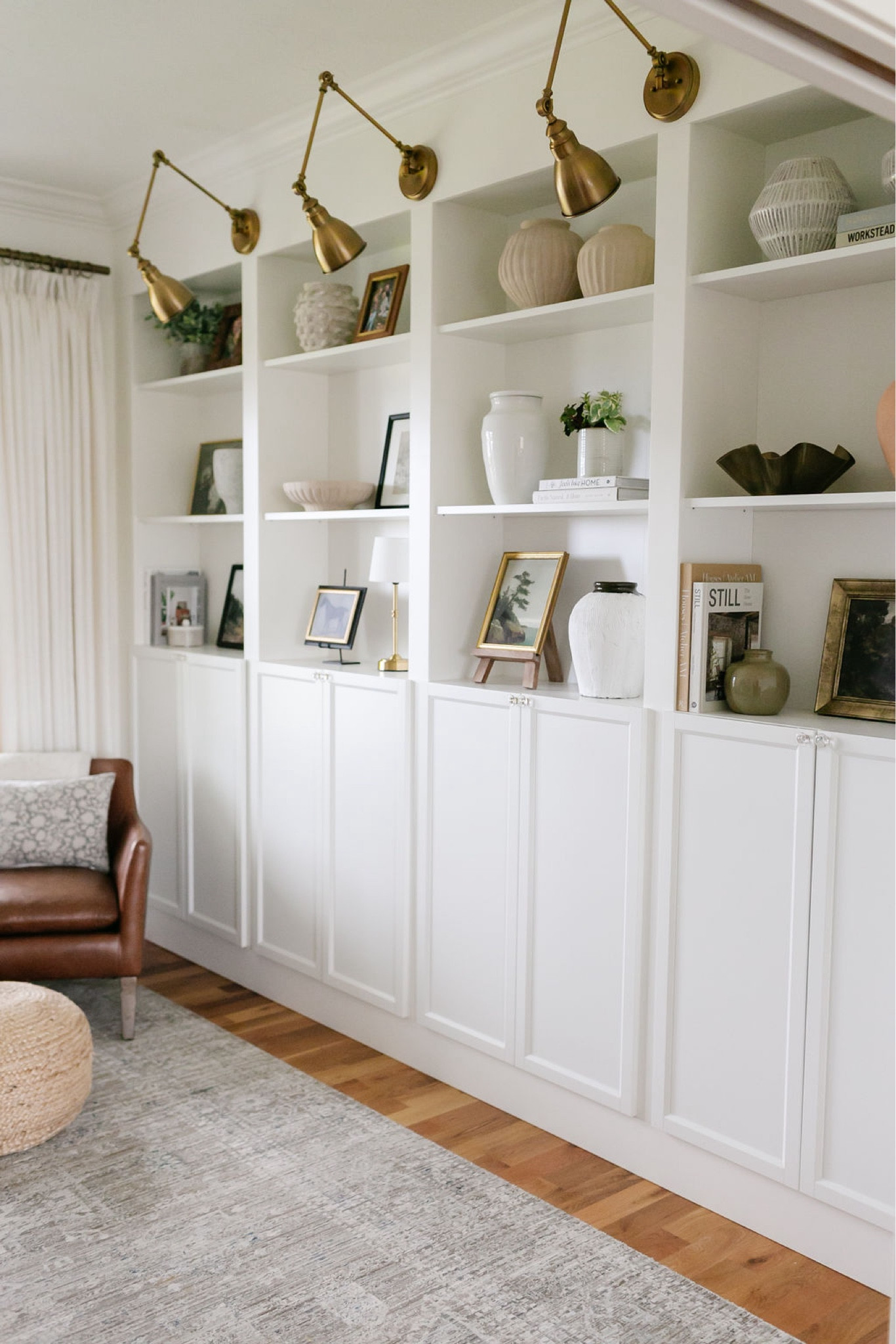 Shelf decor, shelfie, area rug, woven pouf  

#LTKhome #LTKsalealert #LTKfindsunder50