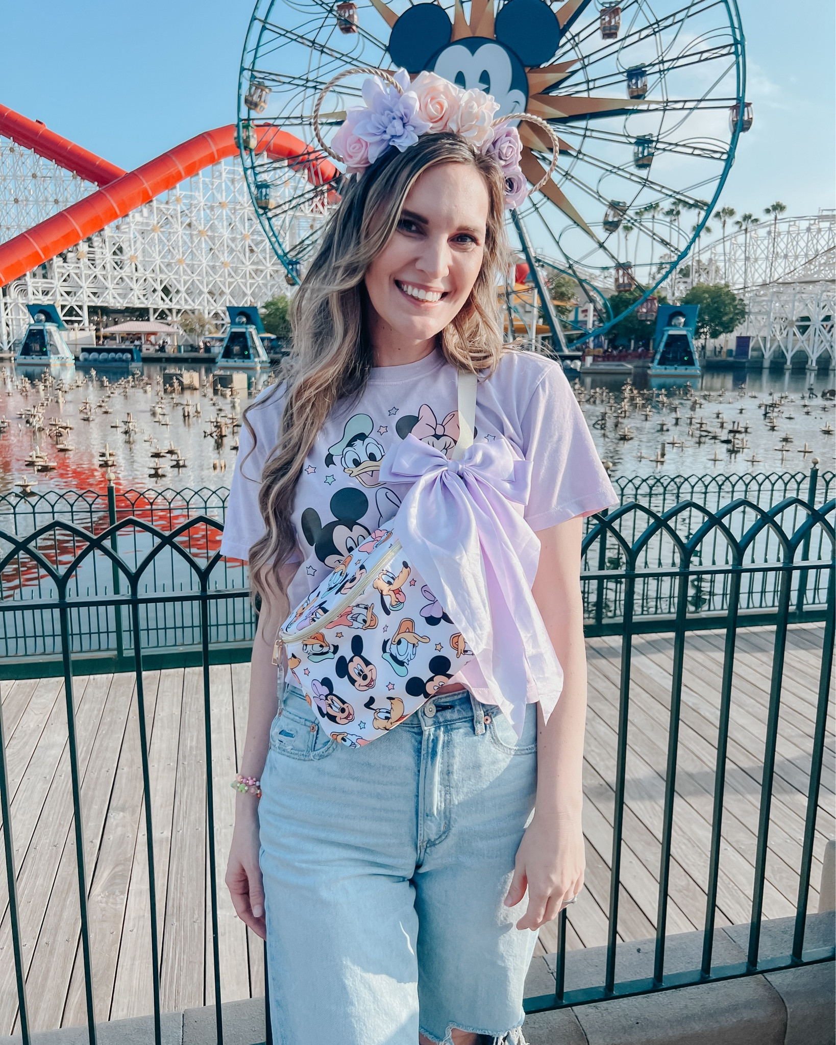 ✨Disneyland Outfit Details ✨
 Heading to the parks soon? Here’s my pastel Disneyland outfit idea featuring my Pastel Pals jumbo fanny pack, matching Pastel Pals tee, and my go to American Eagle jeans for all day comfort. 💗🎀

I linked everything so you can easily shop this whole look, perfect for comfy park days, spring trips, or anyone who loves a soft + girly Disney vibe. 🌸🐭

Tap to shop the full outfit ➡️ • pastel Disney fanny pack • pastel Disney graphic tee • comfy American Eagle jeans • park-day accessories

Save this for outfit inspo & follow for more Disney style, park outfits, and pastel fashion! ✨💕

#LTKootd #LTKFindsUnder50 #LTKGiftGuide