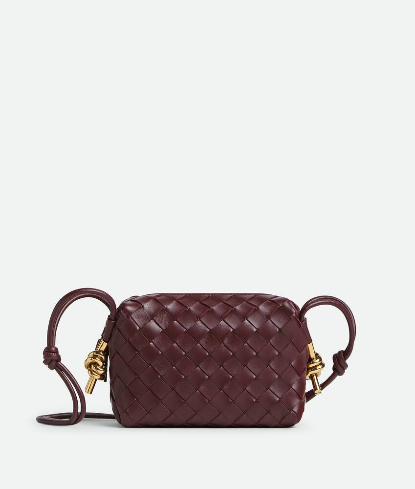 Bottega Veneta® Women's Mini Loop Metal Knots in Madder brown. Shop online now. | Bottega Veneta