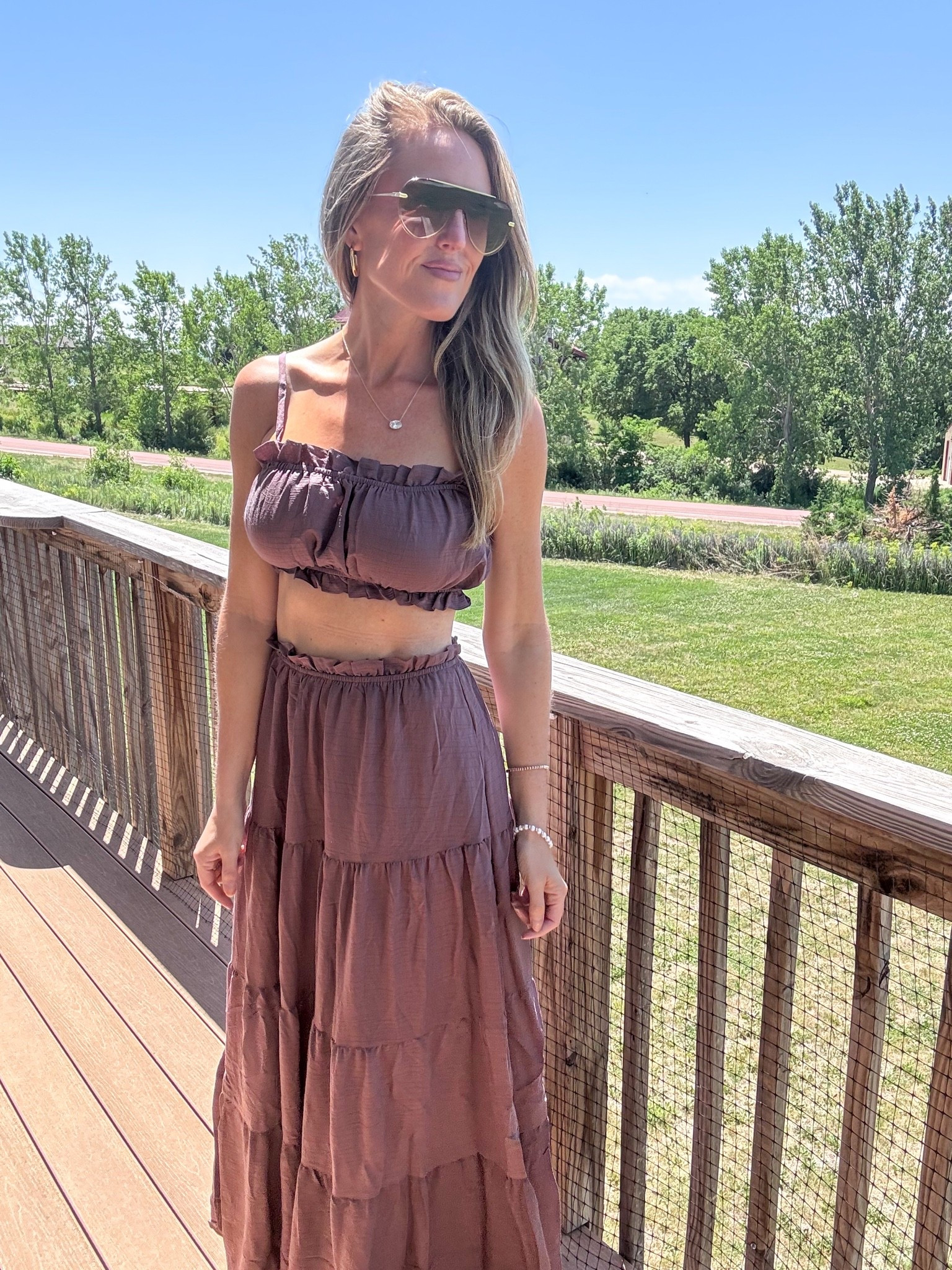 This brown 2 piece set is both cute and comfy! 🤎 Perfect for a summer day at the lake or beach! Wearing a small.

As an Amazon Influencer I earn commission on qualifying purchases.

Brown two piece skirt set, summer sets, summer outfit idea, effortless fashion, spring fashion 2026, flowy skirt set, Diff sunglasses

#LTKMidsize #LTKootd #LTKgrwm