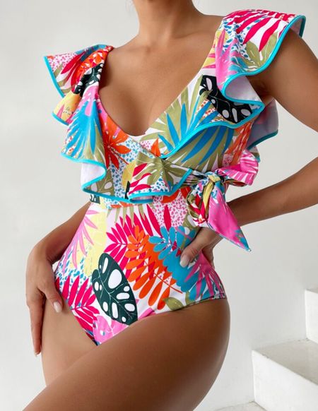 Do we love this suit or do we love this suit?!?!  😍 Love the colors, design, and florals! 


Shein swimsuit 
Bathing suit 
Floral swim 
Colorful swimsuit 
Ruffle one piece 

#springoutfits #fallfavorites #LTKbacktoschool #fallfashion #vacationdresses #resortdresses #resortwear #resortfashion #summerfashion #summerstyle #LTKseasonal #rustichomedecor #liketkit #highheels #Itkhome #Itkgifts #Itkgiftguides #springtops #summertops #Itksalealert
#LTKRefresh #fedorahats #bodycondresses #sweaterdresses #bodysuits #miniskirts #midiskirts #longskirts #minidresses #mididresses #shortskirts #shortdresses #maxiskirts #maxidresses #watches #backpacks #camis #croppedcamis #croppedtops #highwaistedshorts #highwaistedskirts #momjeans #momshorts #capris #overalls #overallshorts #distressesshorts #distressedjeans #whiteshorts #contemporary #leggings #blackleggings #bralettes #lacebralettes #clutches #crossbodybags #competition #beachbag #halloweendecor #totebag #luggage #carryon #blazers #airpodcase #iphonecase #shacket #jacket #sale #under50 #under100 #under40 #workwear #ootd #bohochic #bohodecor #bohofashion #bohemian #contemporarystyle #modern #bohohome #modernhome #homedecor #amazonfinds #nordstrom #bestofbeauty #beautymusthaves #beautyfavorites #hairaccessories #fragrance #candles #perfume #jewelry #earrings #studearrings #hoopearrings #simplestyle #aestheticstyle #designerdupes #luxurystyle #bohofall #strawbags #strawhats #kitchenfinds #amazonfavorites #bohodecor #aesthetics #blushpink #goldjewelry #stackingrings #toryburch #comfystyle #easyfashion #vacationstyle #goldrings #fallinspo #lipliner #lipplumper #lipstick #lipgloss #makeup #blazers #LTKU #primeday #StyleYouCanTrust #giftguide #LTKRefresh #LTKSale
#LTKHalloween #LTKFall #fall #falloutfits #backtoschool #backtowork #LTKGiftGuide #amazonfashion #traveloutfit #familyphotos #liketkit #trendyfashion #fallwardrobe

#LTKswim #LTKtravel #LTKFind
