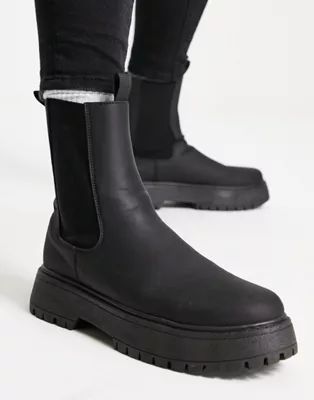 ASOS DESIGN chelsea calf boots with chunky sole in black faux leather | ASOS (Global)