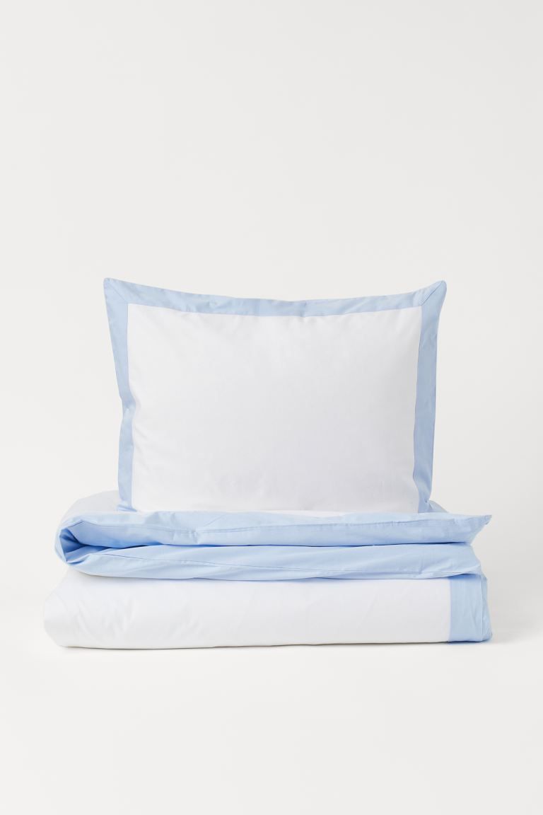 Twin duvet cover set in cotton sateen with contrasting trim at edges. Duvet cover fastens at foot... | H&M (US + CA)