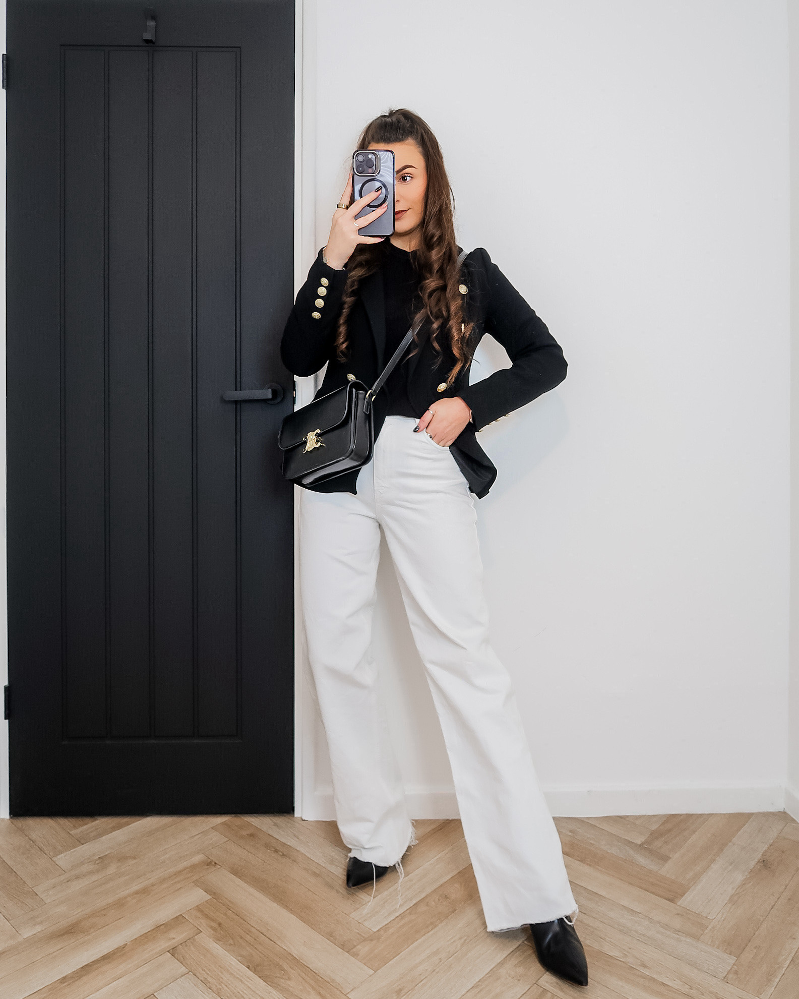 black double breasted blazer, gold button blazer, white flare jeans, white flared denim outfit, black knit jumper outfit, chic monochrome outfit, classic blazer outfit women, old money style outfit, black and white outfit aesthetic, Celine crossbody bag outfit 

#LTKuk #LTKspring #LTKeurope