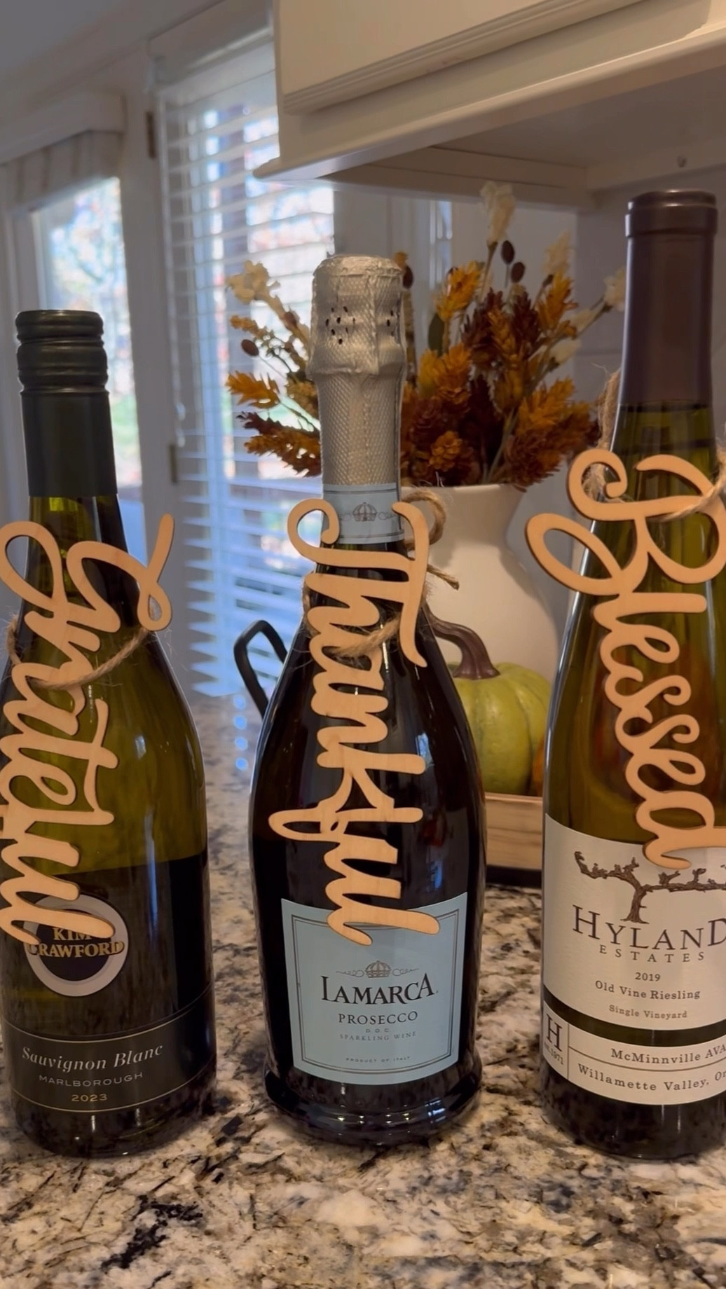 Hostess Gift Idea! Make a bottle of wine more personal when gift giving. Gift for her, gift for friends, gift for neighbors. You can choose different shapes or words based on occasion. #hostessgift #hostgift #smallgiftidea #winegift #giftidea

#LTKSeasonal #LTKGiftGuide #LTKHoliday