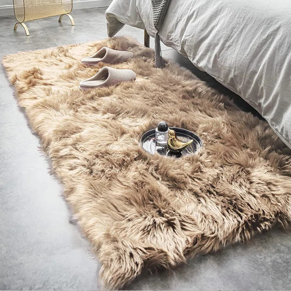 Malaiah Hand Tufted Faux Sheepskin Solid Color Rug | Wayfair North America