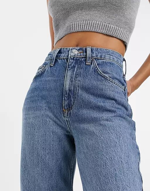 ASOS DESIGN high rise 'slouchy' mom jean in midwash | ASOS (Global)