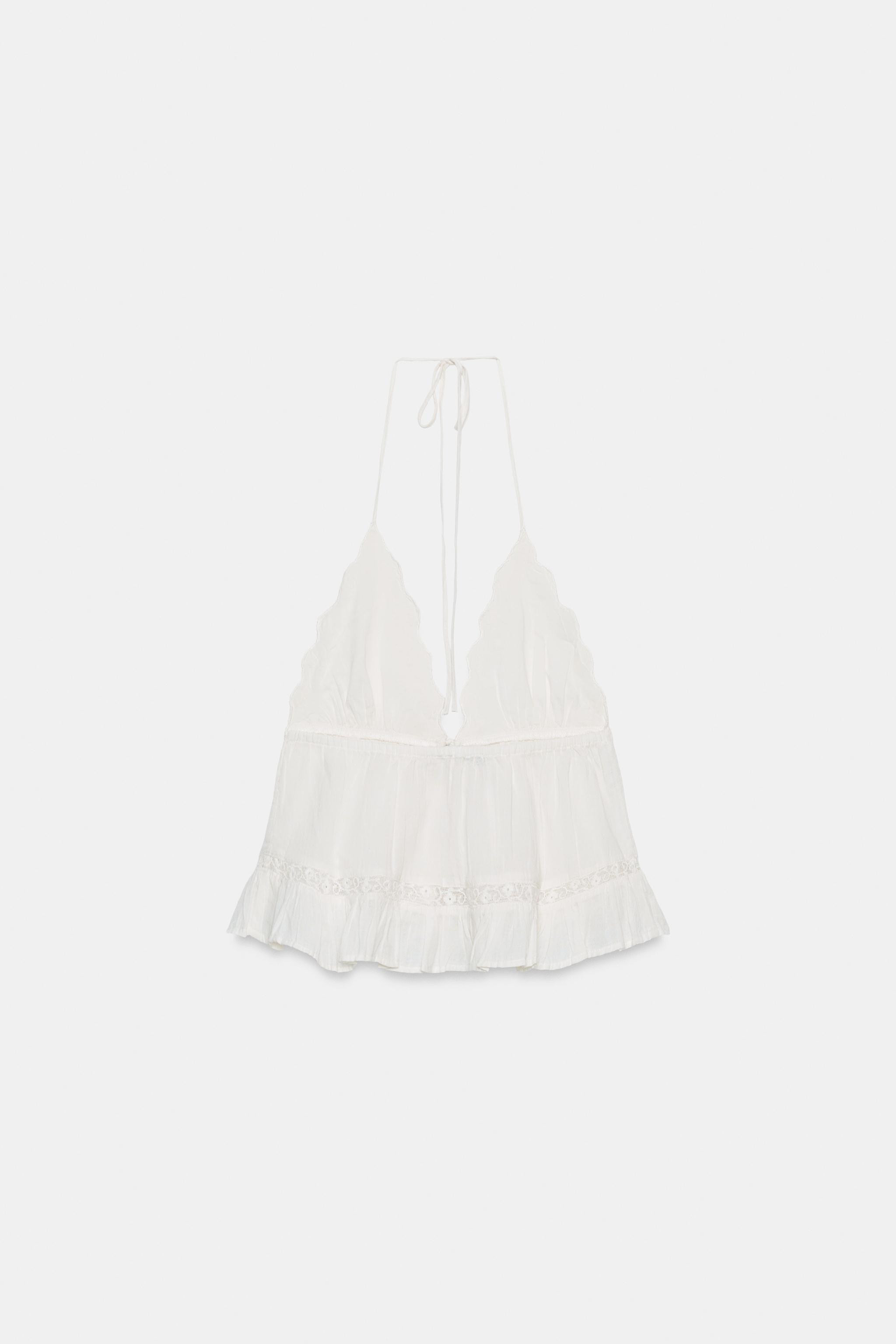 Top \u00e0 encolure am\u00e9ricaine et col en V. D\u00e9tail de broderies ton sur ton. Fermeture ... | Zara FR