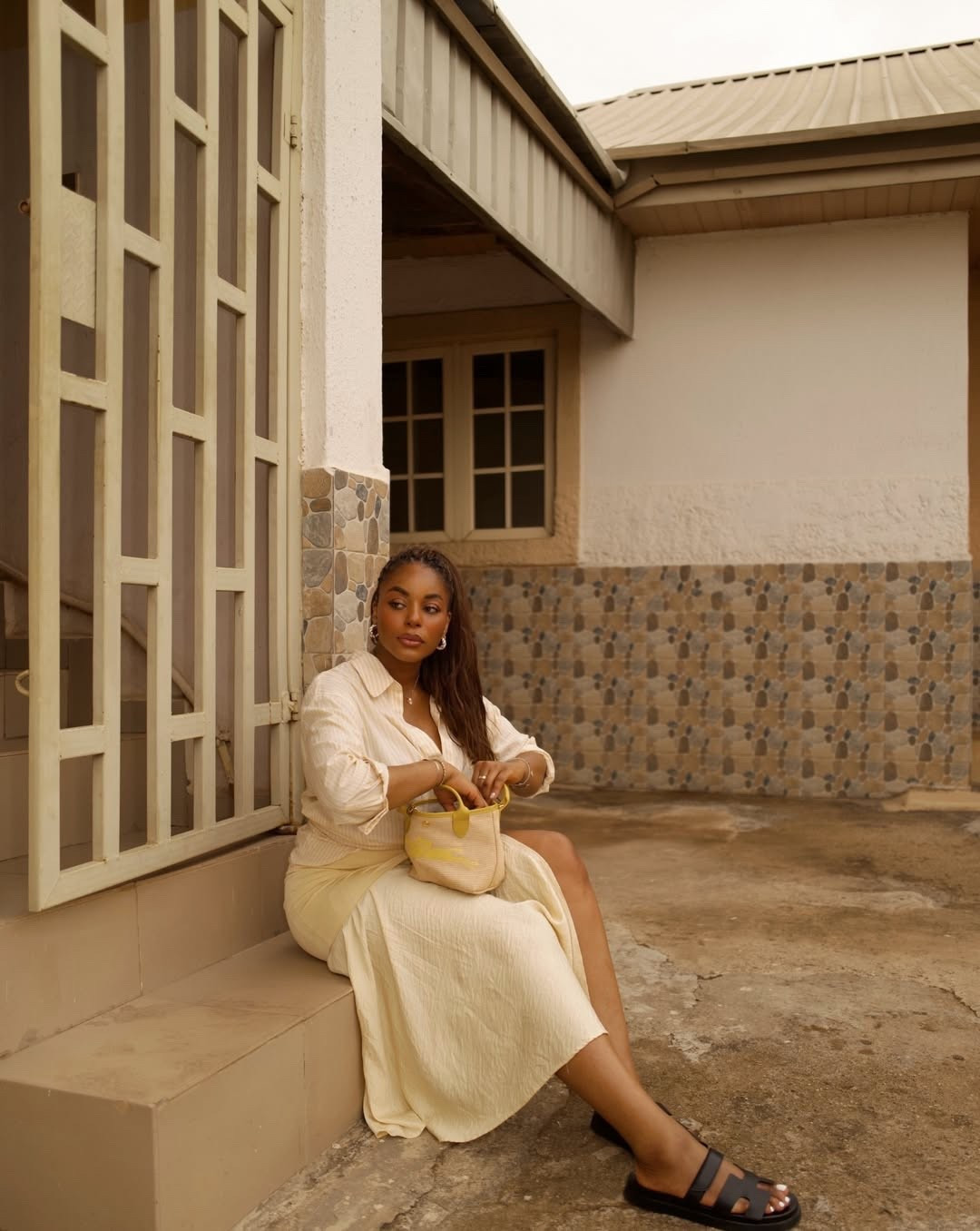 Spring outfit idea for you! wearing a monochrome butter yellow monochrome outfit. Wearing button up shirt, midi skirt, black sandals, longchamp handbag. Loving this effortless spring outfit for brunch, work and beyond … For more links to spring outfits 2026, country concert outfits, spring dresses, date night outfits, vacation outfits beach, business casual workwear, work outfts, travel outfits, follow me on LTK! ✨


#LTKootd #LTKTravel #LTKSeasonal