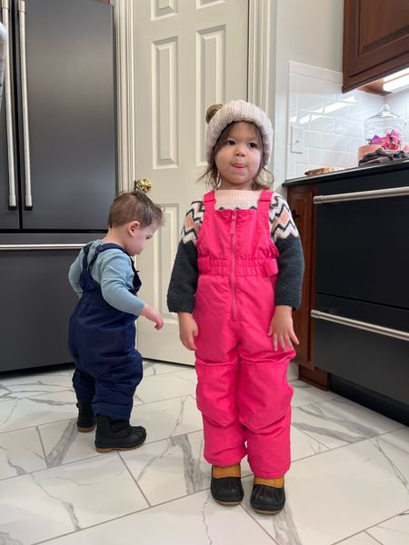 Their first snow day together 🥹🥰 love these toddler snow bibs and snow boots that kept their clothes underneath completely dry 🙌🏼 Was a great last minute purchase to get them out and playing in the snow. Also linking our new kitchen details such as the fridge, marble floor tile and dual drawer dishwasher. We got matte black in all the appliances and love them! Definitely fingerprint resistant 🙌🏼 

Toddler snowsuit. Toddler style. Siblings. Toddler outfit. Winter outfit. Toddler fashion. Toddler girl. Toddler boy. Target style. Kitchen inspo. Cafe appliances. Kitchen appliances. 

#LTKSeasonal #LTKfamily