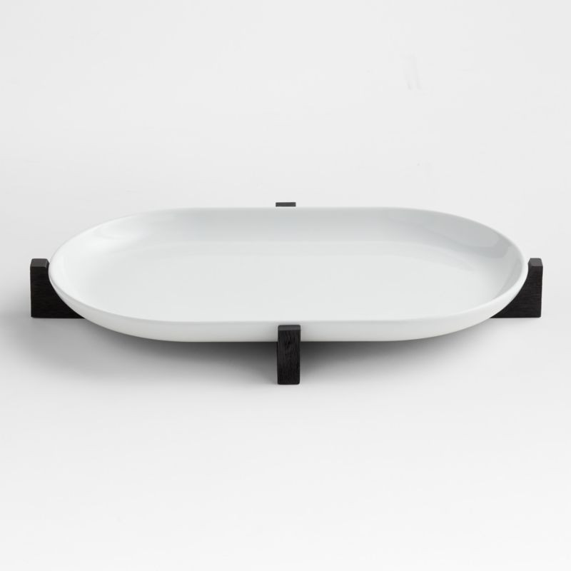 Oven-to-Table Oval Platter with Black Wood Trivet + Reviews | Crate & Barrel | Crate & Barrel