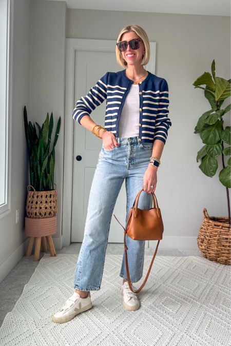 Casual spring outfit with straight leg jeans, ribbed tank, light weight lady cardigan + sneakers 

This cropped lightweight cardigan from JCrew  is perfect to throw over your shoulders for an elevated look and works in the warmer months in the cold air conditioning 

#LTKOver40 #LTKFindsUnder100 #LTKStyleTip