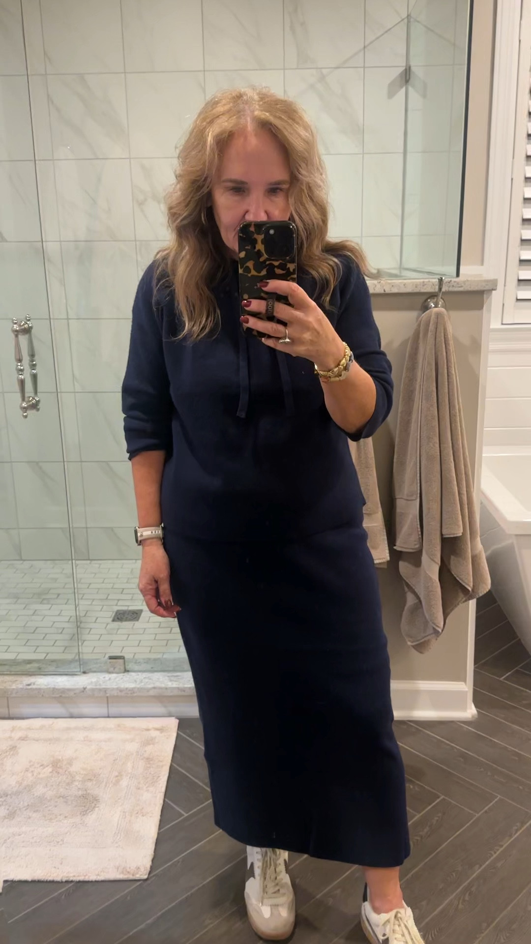 Ready for a busy day work from home! 
Love this sweater skirt and hoodie! Wearing size medium. 

Notice sneakers are VERY comfortable and true to size 

Need a new bra? Love my relief bra by Eby. Save 15% and free shipping with code NANETTEFS15

Fall sneakers dolce vita sneakers 2 piece set target sweaters sweater skirt midi skirt navy hoodie sweater 

#LTKOver40 #LTKMidsize #LTKFindsUnder50