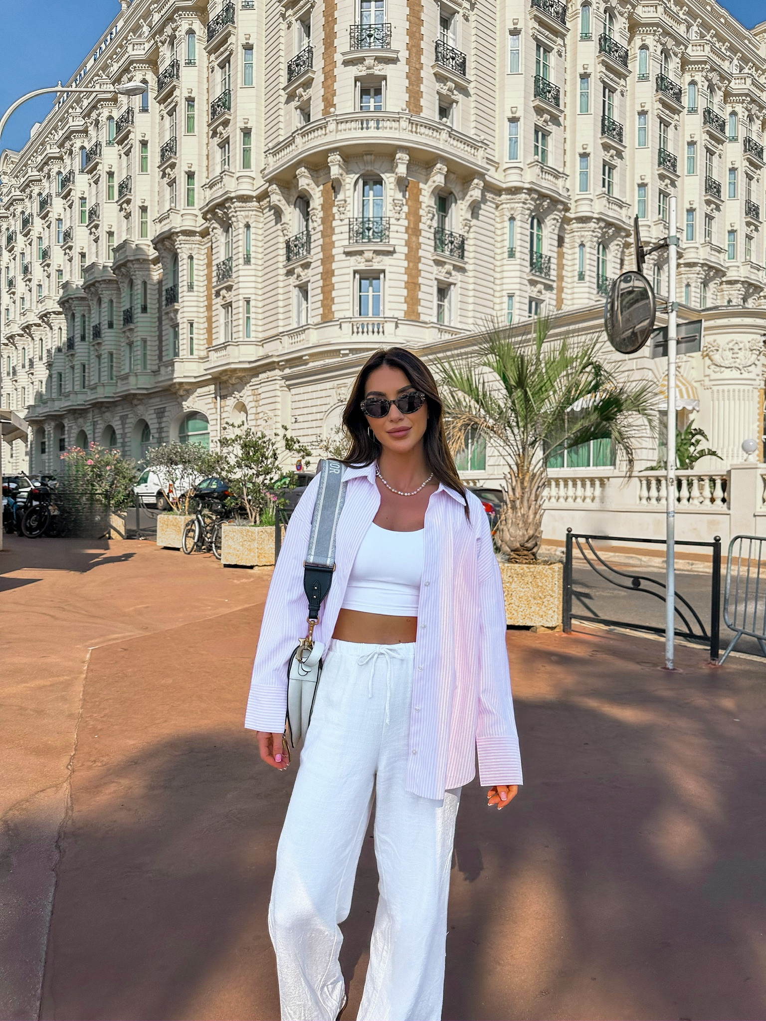 Holiday outfit, summer outfit, light outfit, oversized shirt, stripe shirt, pink shirt, wide leg trouser, white trouser, linen trouser, butterfly sunglasses, saddle bag, white top, crop top, Adanola, Uniqlo, H&M, BooHoo, Free People, Mango, Stradavarius

#LTKeurope #LTKstyletip #LTKSeasonal