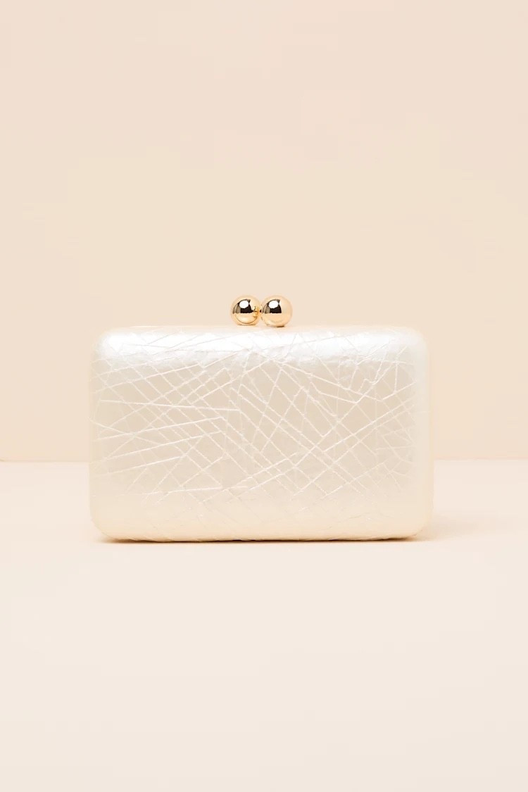 The soft ivory tone and compact crossbody design make this bag an easy staple for pairing with feminine dresses, tailored sets, and chic casual outfits. Under $40.

Keywords:

* ivory crossbody clutch
* textured clutch bag
* neutral handbag
* elegant crossbody purse
* minimalist clutch
* evening crossbody bag
* women’s occasion handbag
* chic ivory accessory
* wedding guest accessories
* European summer fashion
* vacation handbag
* brunch outfit accessories
* day to night styling
* elevated casual fashion
* resort chic aesthetic
* feminine neutral fashion

#LTKTravel #LTKWedding #LTKgrwm