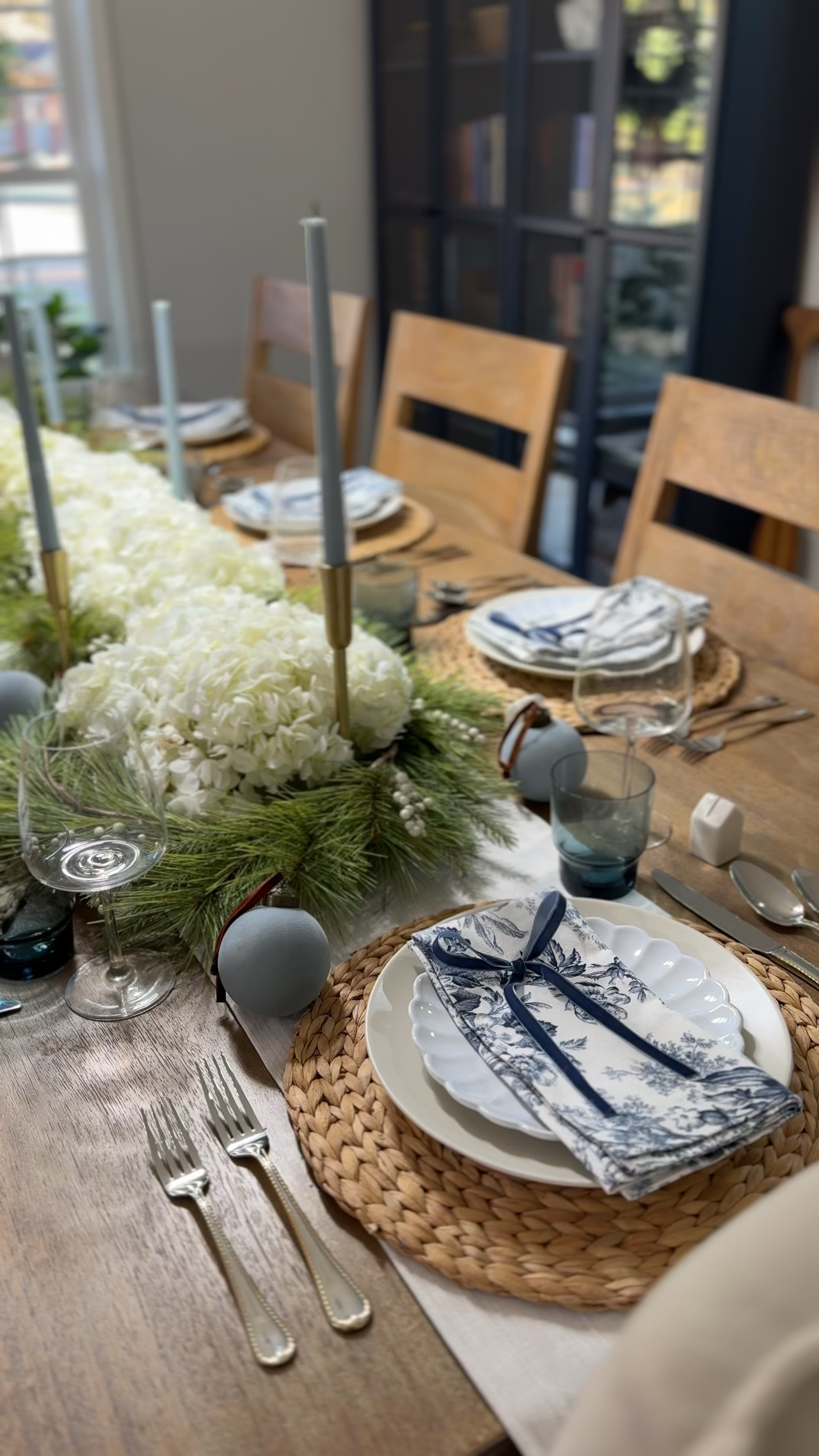 Christmas tablescape inspiration! I am getting so excited to host my family and parents (from Pennsylvania) for Christmas dinner in our new home. I was inspired by my love for New England and really leaned into my personal favorites: blue, bows, hydrangeas, scallop details, and place card settings. 

Everything is linked and sourced from different stores/brands I love!

#LTKHome #LTKHoliday #LTKSeasonal