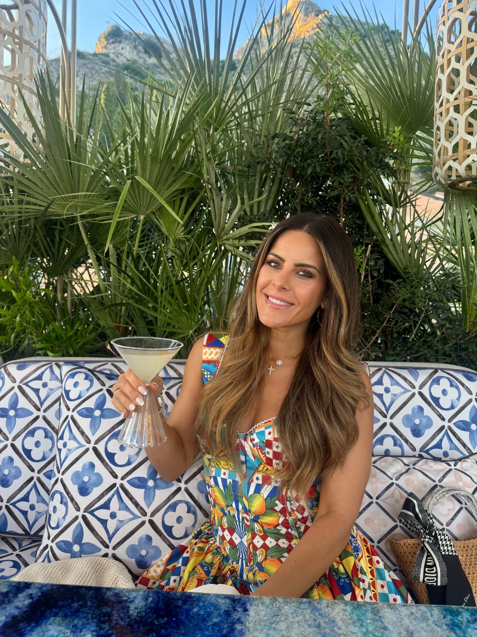 🥂 Sicilian Sunset Chic at Le Bar Louis Vuitton 🍋

Trading cobblestone streets for a rooftop view! 🇮🇹 This is your sign to wear all the color on your Italian vacation, especially when you have a booking at Le Bar Louis Vuitton in Taormina. The views of the Ionian Sea and Mount Etna are breathtaking, and a colorful, elegant dress is the only accessory you need! 💙💛
The LV space is all blue and white Maiolica tiles and lush greenery, so this vibrant print totally pops against the backdrop. Dress code is elegant, so keep it chic, no matter how hot it is!

#LTKtravel #LTKItaly #LeBarLouisVuitton #Taormina #SicilyStyle #ElegantOutfit #VacationDress #LuxuryTravel #OOTN #LVByThePool #Summerdress
