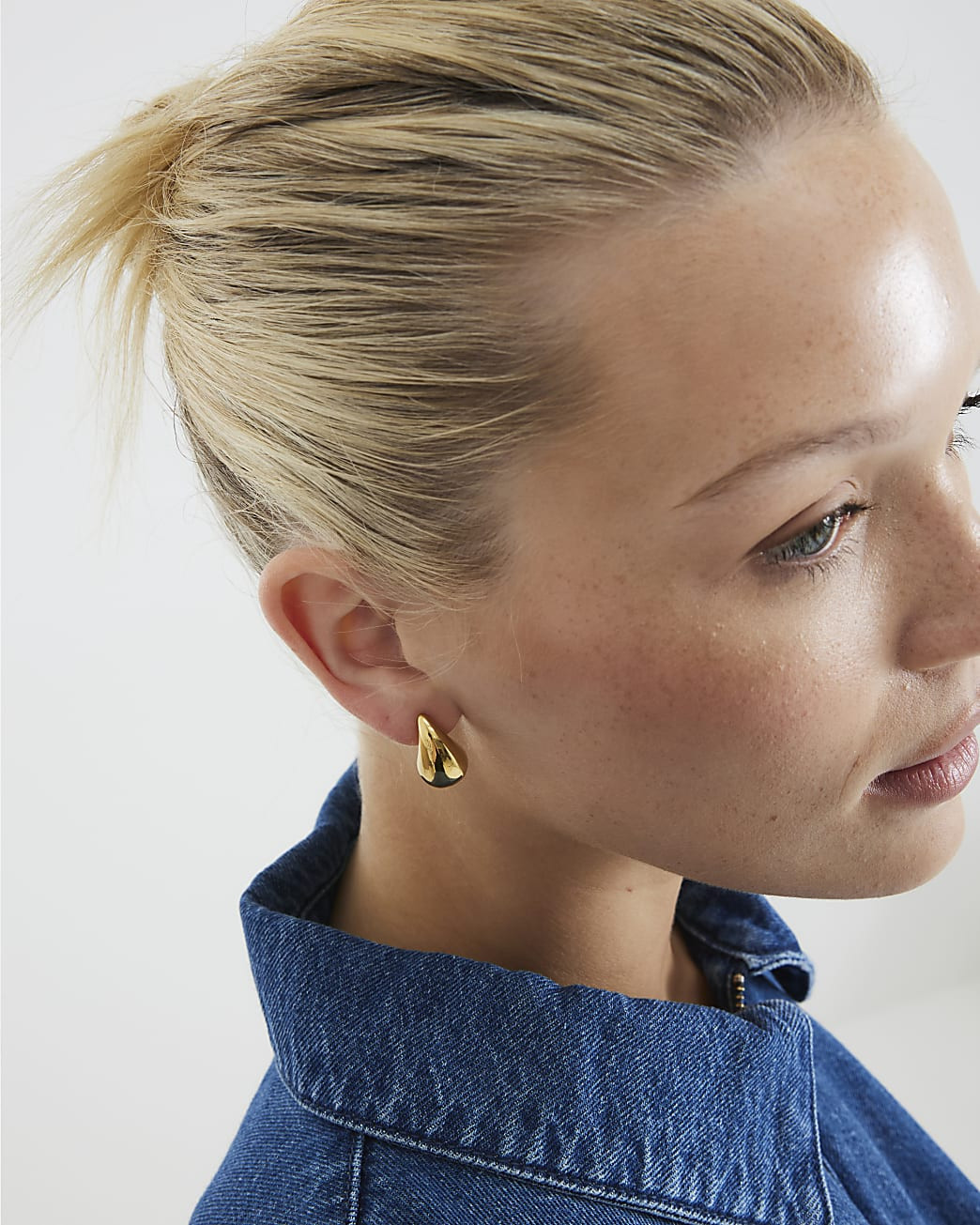 Gold Stainless Steel Dome Stud Earrings | River Island UK & IE