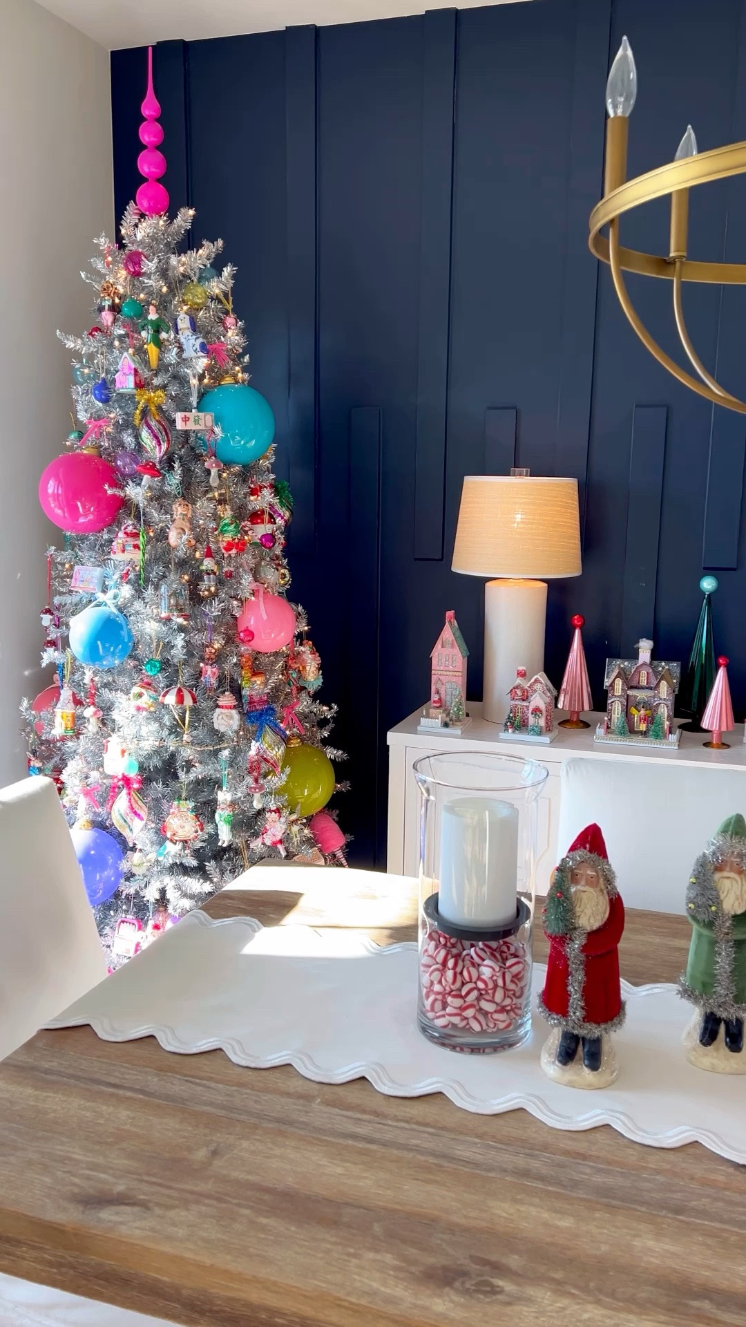 Whimsical Christmas decor, colorful Christmas decor, pink antlers Christmas decor, Cody foster Christmas house, Christmas village, Santa, vintage Christmas, Christmas ornaments, table runner, Christmas table

See my LTK page for more of these items linked! Can only link so many per post!🩷

Love how the dining room looks all dressed up for Christmas! These Christmas village houses are one of my favorite things to collect!❄️🎄🎀 and these vintage Santas all look SO cute together as a collection! This scalloped Anthro table runner is so pretty! Comes in lots of cute color combos, great year round! 

#LTKFindsUnder50 #LTKHome #LTKHoliday