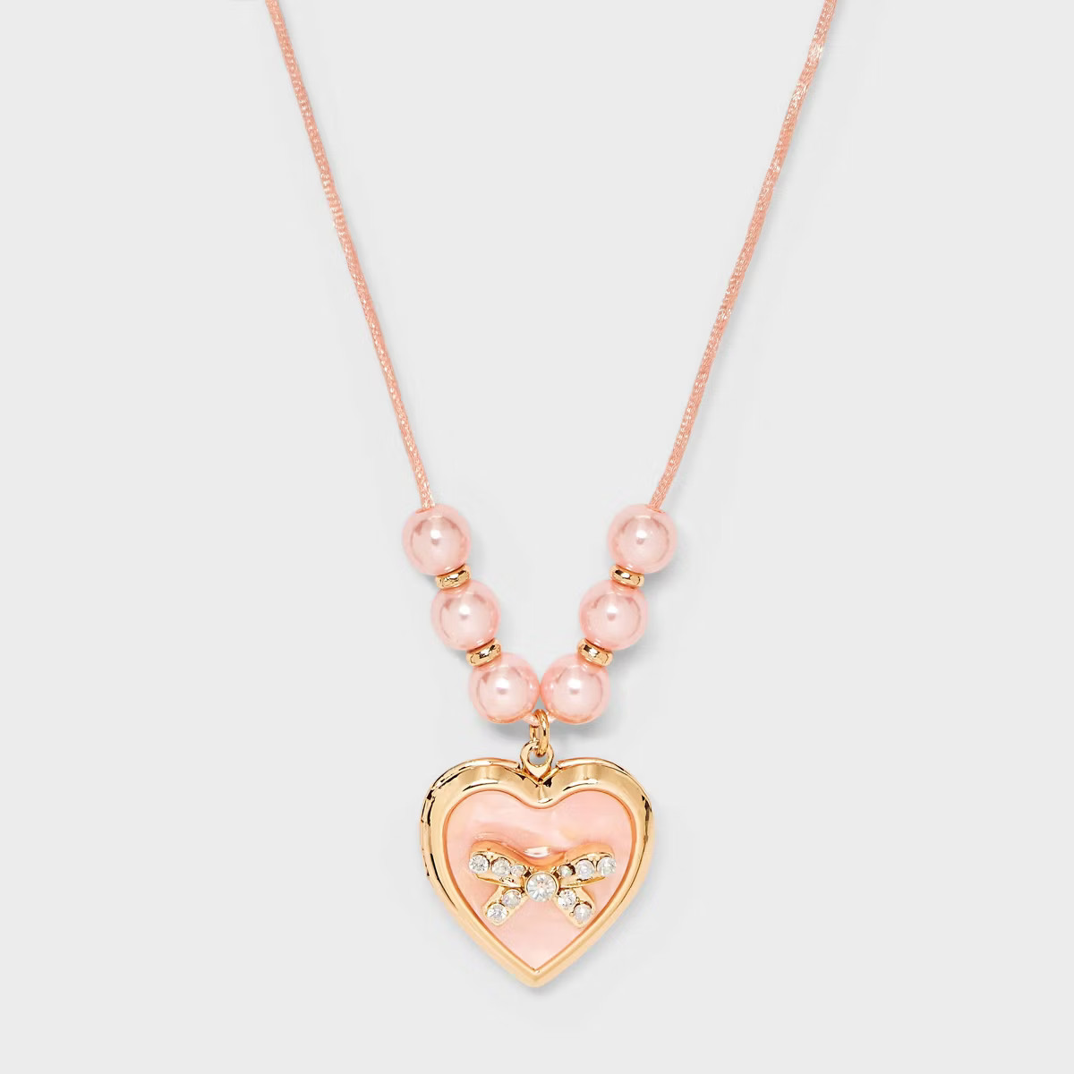 Girls' Pink Bow Locket Necklace - Cat & Jack™ Pink | Target