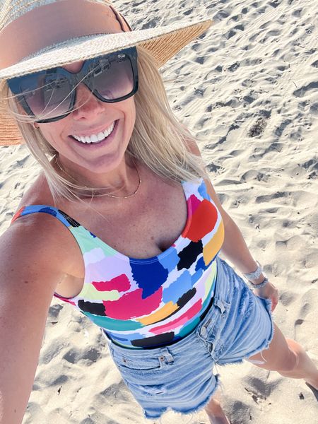 Love this colorful one piece swimsuit with jean shorts and a straw hat. Size small swimsuit which runs true to size. Beach swim bathing suit 

#LTKstyletip #LTKfindsunder50 #LTKswim
