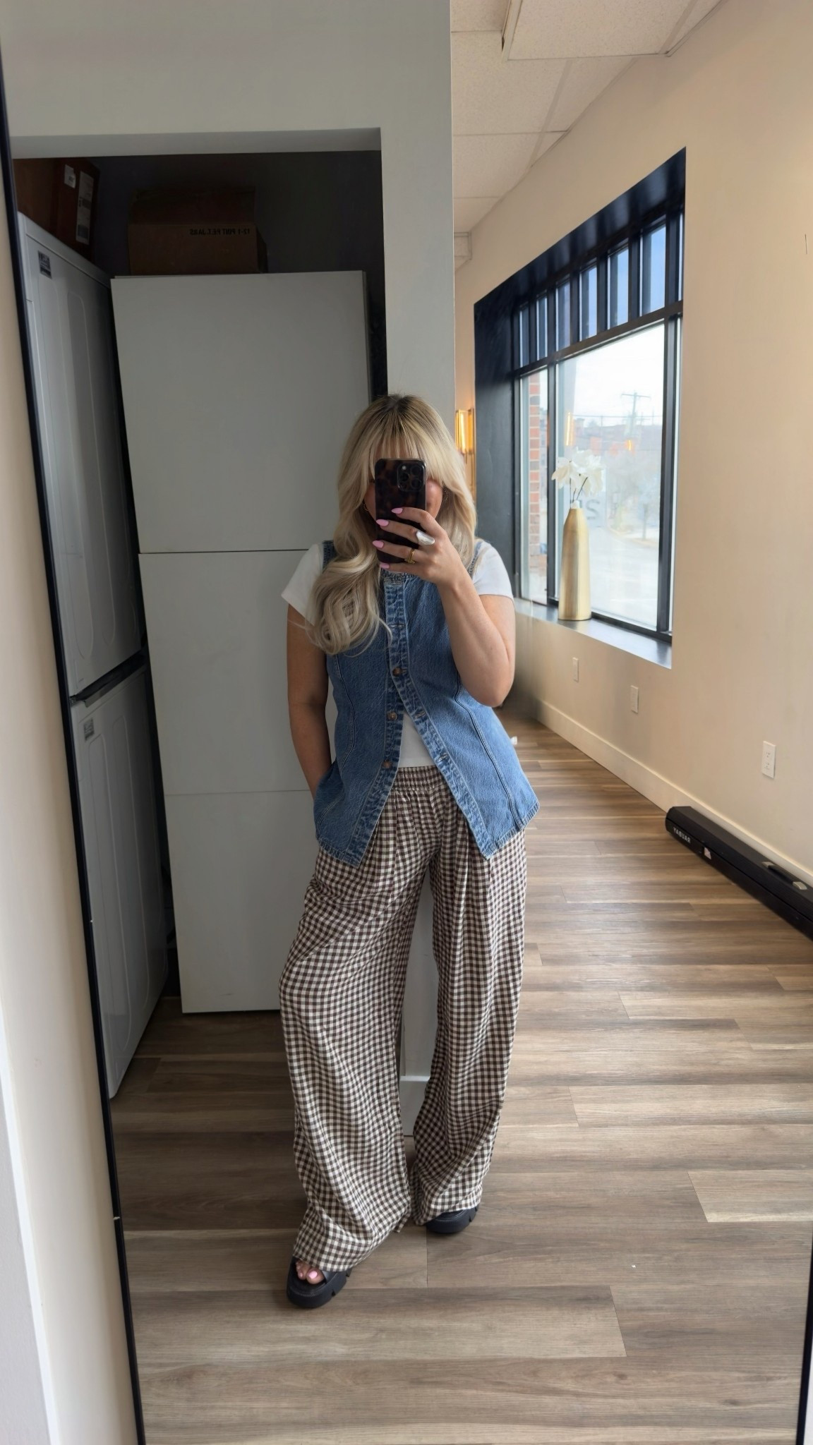 White crew neck short sleeve basic white shirt size small 
Denim button up vest with tie in the back size small 
Urban outfitters Brown and white wide leg checked paints size small (linked the pair I’m wearing a cheaper pair from target as an option) 
Black platform Sorel sandals 

#LTKSpringSale 

#LTKmomlife #LTKootd