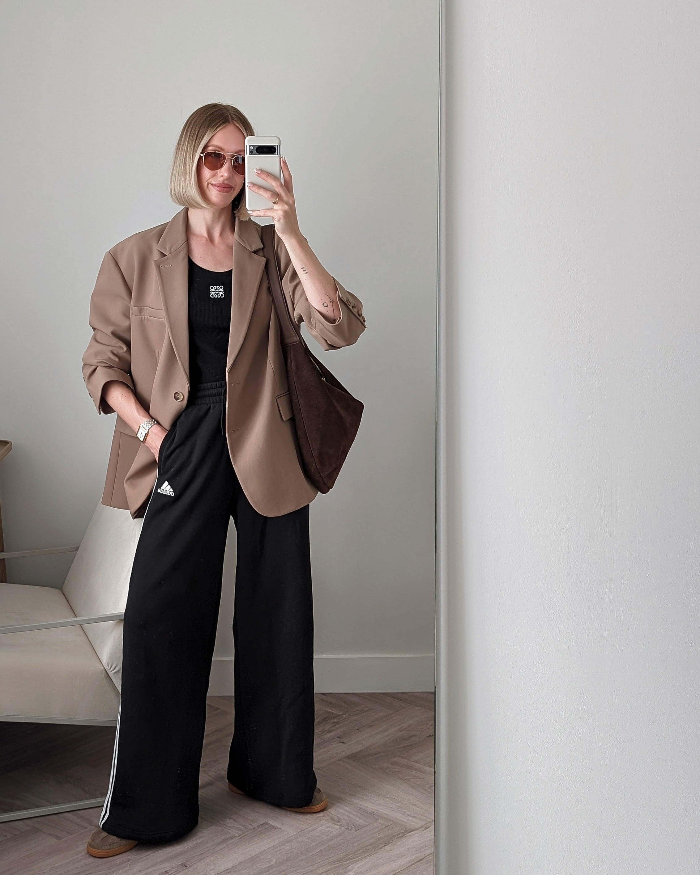 Casual blazer outfit with a 70s vibe styling Adidas three stripe joggers 

#LTKeurope #LTKshoecrush #LTKstyletip