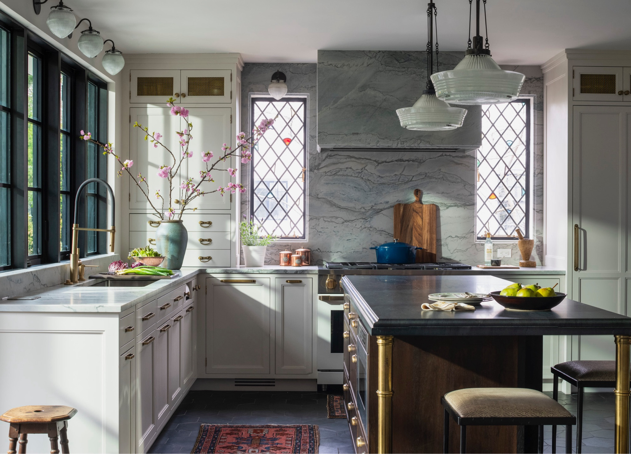 Get inspiration for your kitchen lighting from this Tudor design. The lights were custom made but these picks are similar so you can get the look. 

#LTKHome
