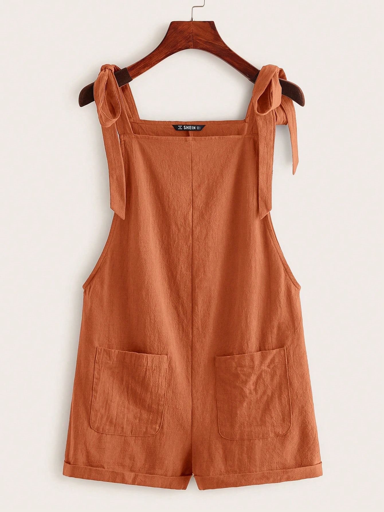 SHEIN EZwear Knot Shoulder Patch Pocket Roll Hem Overall Romper | SHEIN