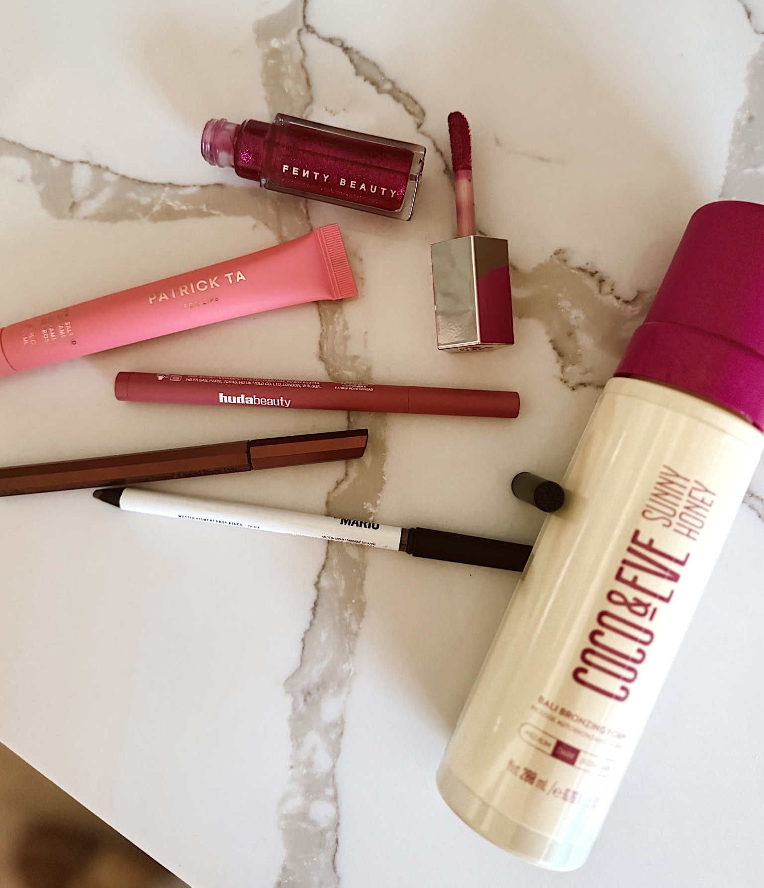 Self-tan + makeup combo lately 🤍✨

Self-tanner (shade dark)
Makeup by Mario eye pencil (taupe)
Billion Dollar Brows pen (taupe)
Huda Beauty lip contour stain (rosewood) — so good
Fenty gloss (fuchsia flex)
Patrick Ta lip (pink salted caramel) — just in the center, super hydrating
	•	yesterday’s Fenty gloss bomb stick (flamingo fling) 💗

All linked 💋

#LTKBeauty #LTKdayinmylife #LTKgrwm