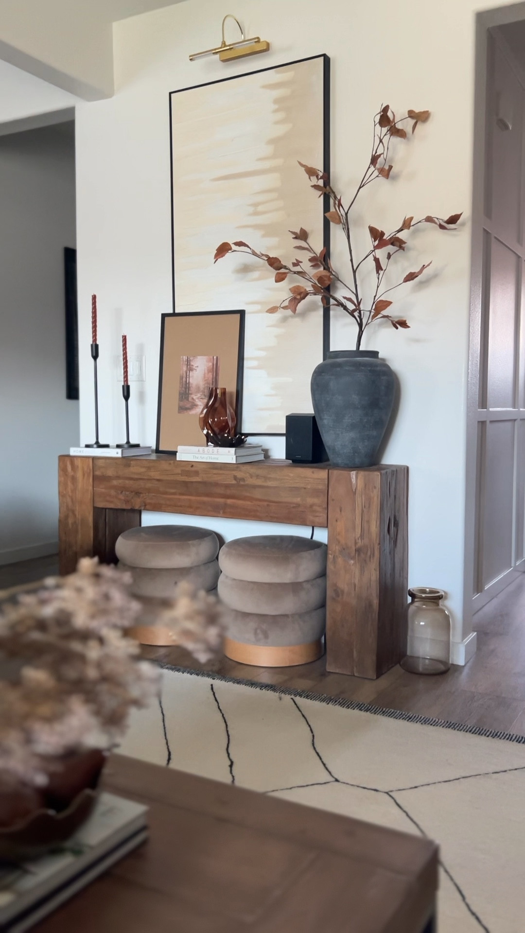 Fall is loading! Gal
Console decor, fall stems, fall vase styling, coffee table books for fall, fall candles, fall artwork

#LTKHome #LTKSeasonal