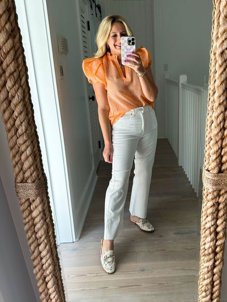 Loving this seersucker orange top with these white jeans and floral mules. Wearing size small top, size 28 jeans. Code FANCY15 for 15% off 

#LTKSeasonal #LTKstyletip #LTKfindsunder100
