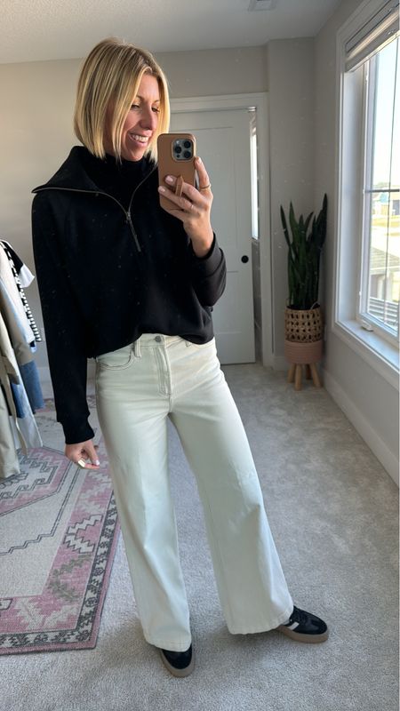 White jeans for spring! My favorite high rise, wide leg jeans now come in a cream!! 👏🏻

I’m wearing a size 28- I’m 5’10” for height reference, these have some stretch! 

Use my code: SARAHKELLYXSPANX
for 10% off my cozy air essentials half zip! I size up to a medium for a relaxed fit 

#LTKstyletip #LTKover40 #LTKSeasonal