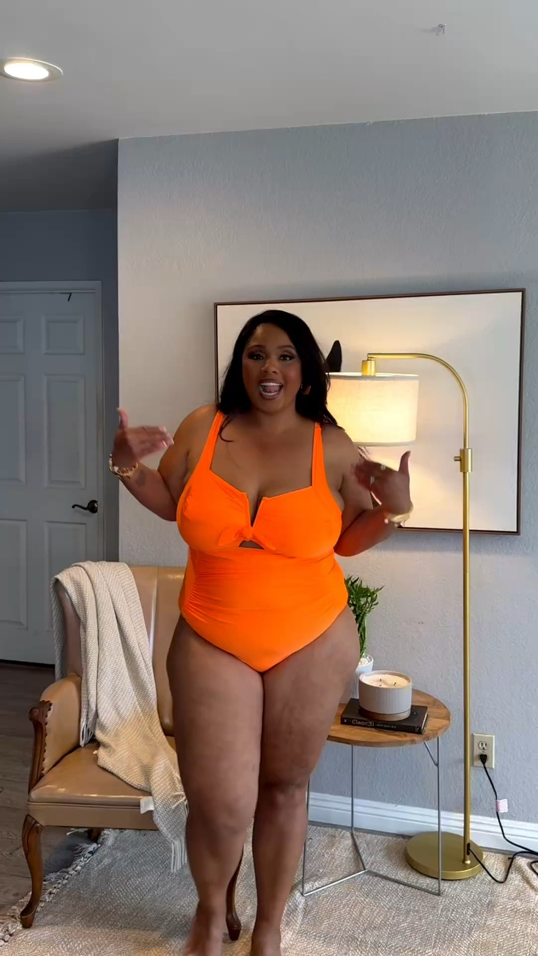 I love this orange swimsuit! I’m wearing a 3X I’m 285 5”11 and F cup. You can adjust the straps. I would say medium super 