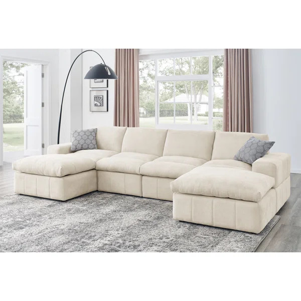 Anchoretta 134" Wide Reversible Modular Sectional with Ottoman | Wayfair North America