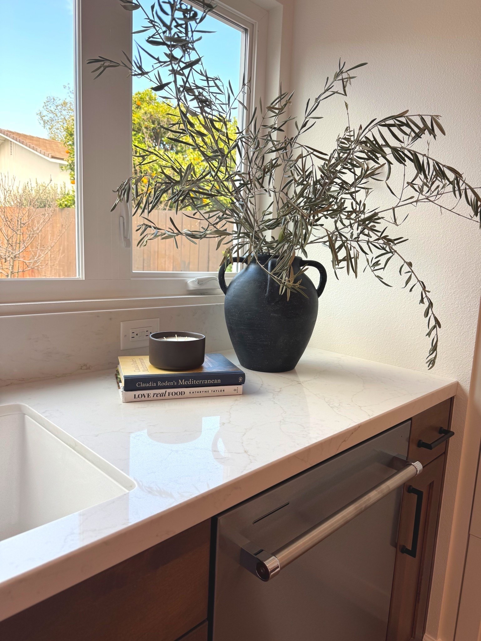 Olive branches, black pots, cookbooks and candles. Hostess gifts ideas  

#LTKHome