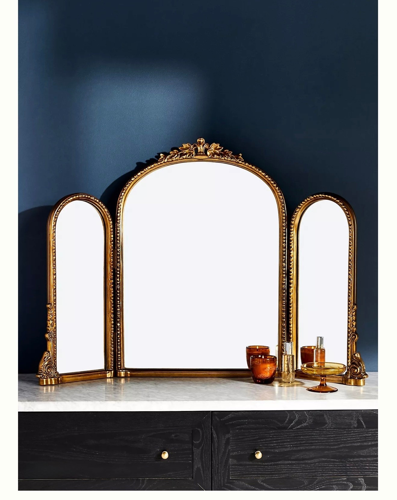 The Gleaming Primrose Triptych Mirror

Stunning, vintage-inspired, and social-media-famous, the Gleaming Primrose Mirror is our bestselling style of all time. It's an icon, beloved for its exquisite details, including elegant adornments along its apex and edges

#LTKHoliday #LTKGiftGuide #LTKHome
