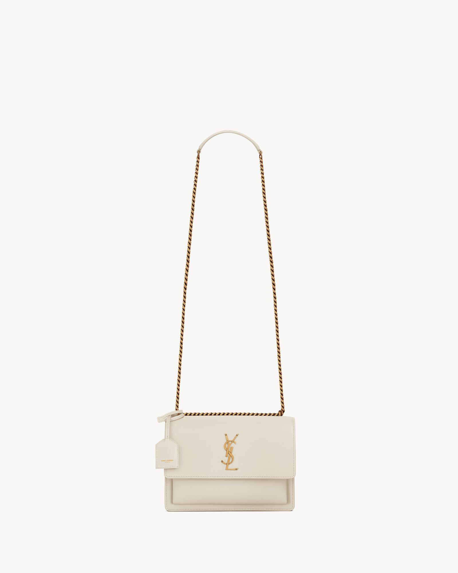 LEATHER-LINED FLAP BAG WITH THE CASSANDRE AND DETACHABLE LEATHER CHARM. FUNCTIONAL AND STRUCTURED... | Saint Laurent Inc. (Global)
