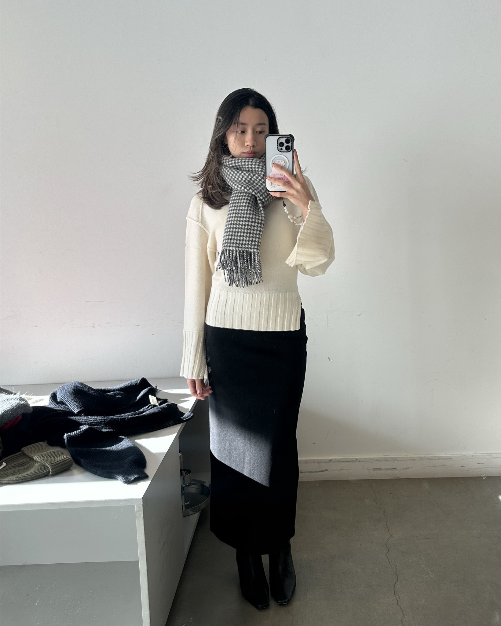Love this 100% Wool Side Slit Jumper / Sweater by Arket! It’s warm and stylish with just the right amount of details to not make this another basic white sweater. Unfortunately sold out and I can’t find it anywhere… Will be linking similar styles to this post when I’m able to find one

Paired it with the Arket Stretch Midi Skirt that has a zipper at the back bottom of the skirt so you can adjust the stretch of skirt bottom. Scarf is by Sezane and is 100% Virgin Wool

#LTKsale #LTKstyletip #LTKworkwear