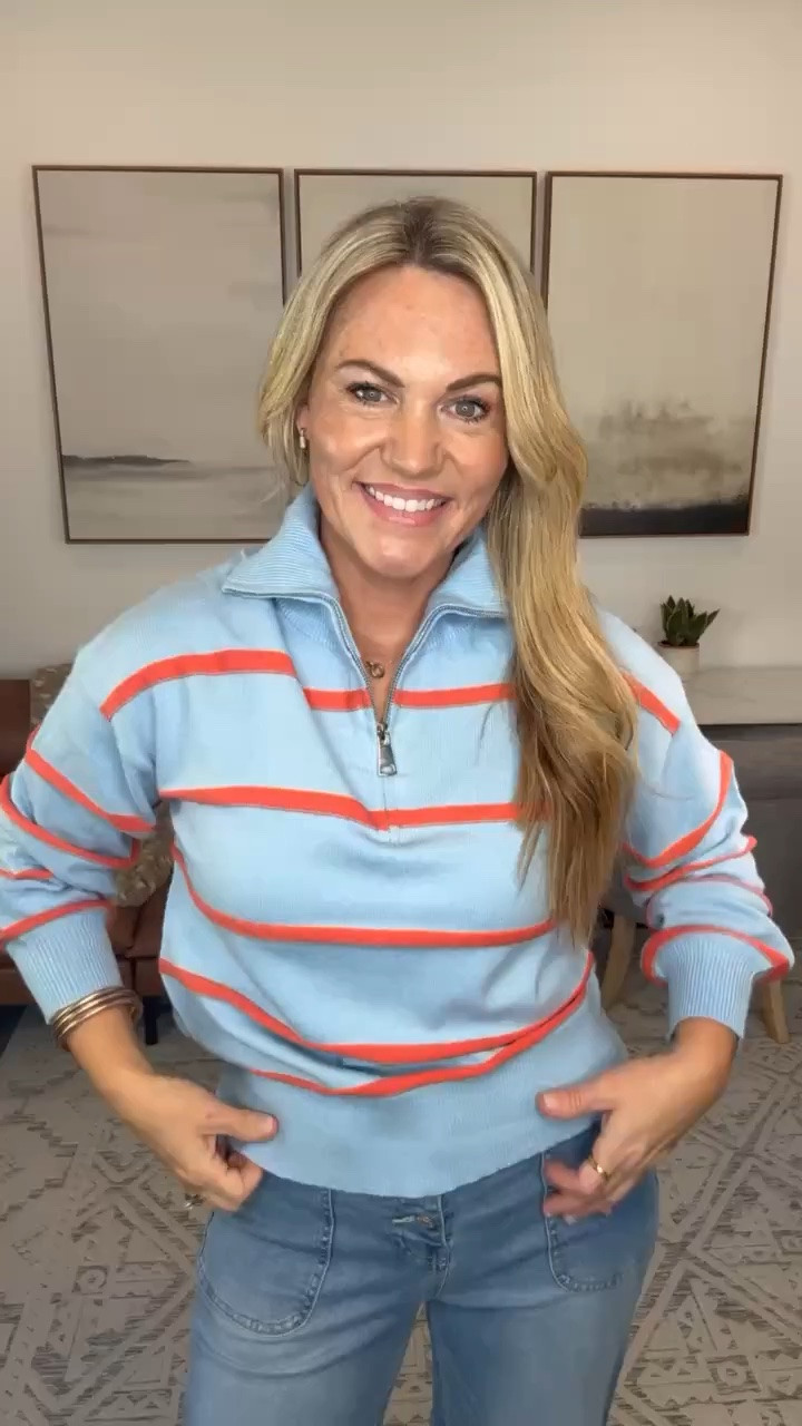 This striped quarter zip is such a good answer to those in between weather days. The blue and coral combo gives jeans a little more personality while still being easy enough for a casual workday or weekend plans.

striped quarter zip, women’s pullover, transitional outfit, casual fall outfit, wide leg jeans, blue striped sweater, early fall style, casual weekend outfit, everyday layers, women’s fall fashion, AudrieDollins

#LTKootd #LTKSeasonal #LTKOver40