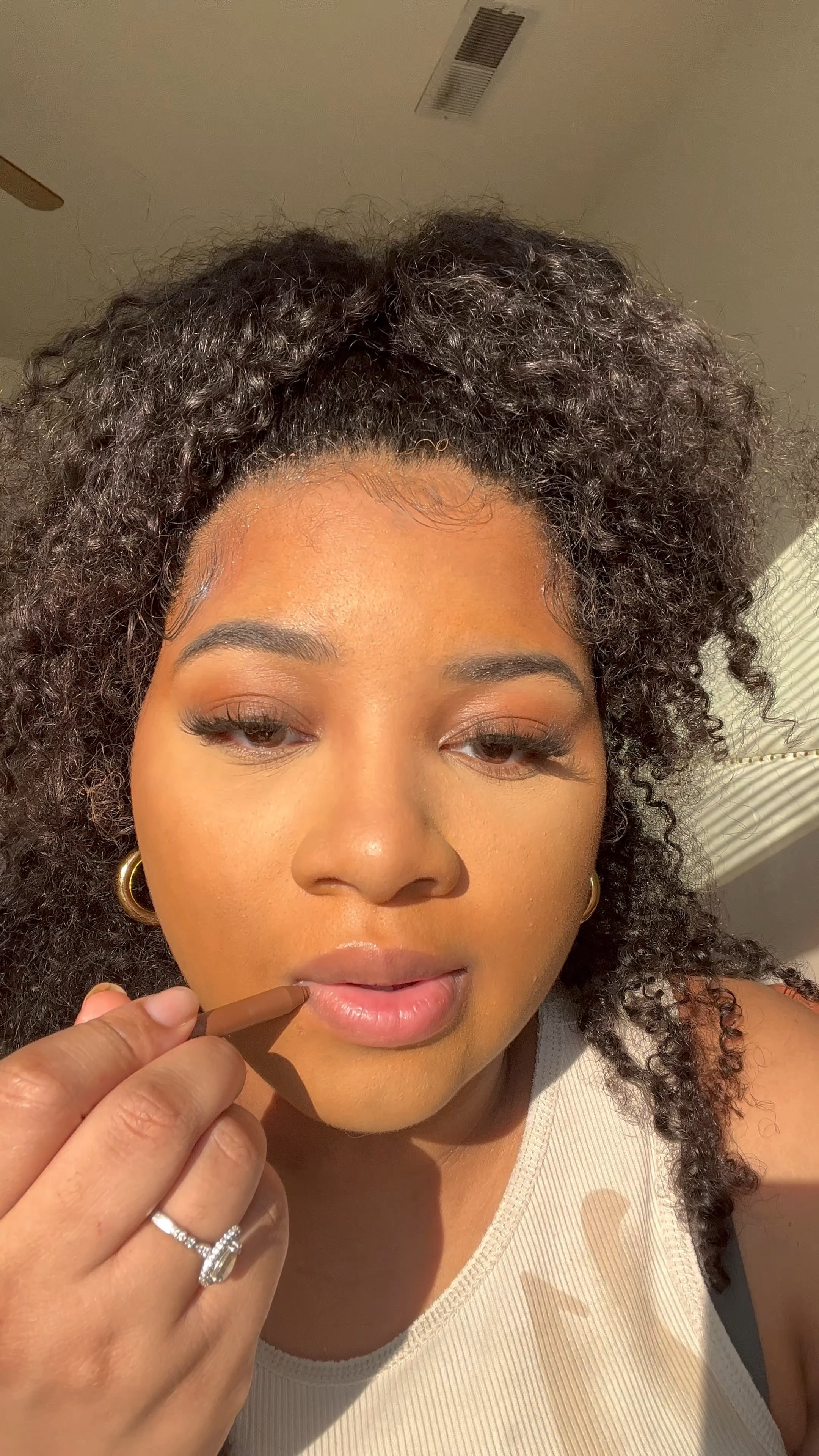 Golden hour and lip gloss✨

#LTKbeauty