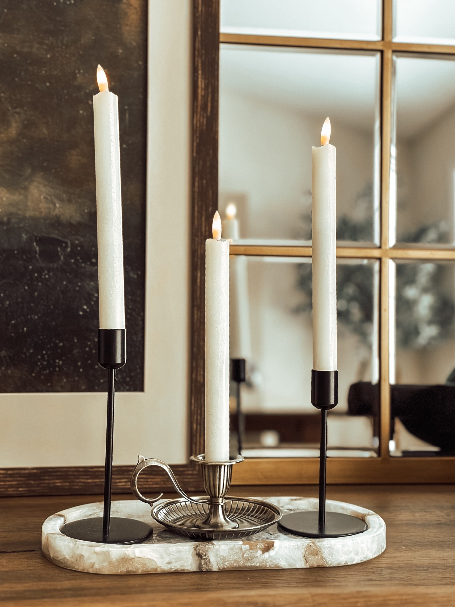 Amazon candle holder and my favorite Flameless candle sticks 

#LTKHome