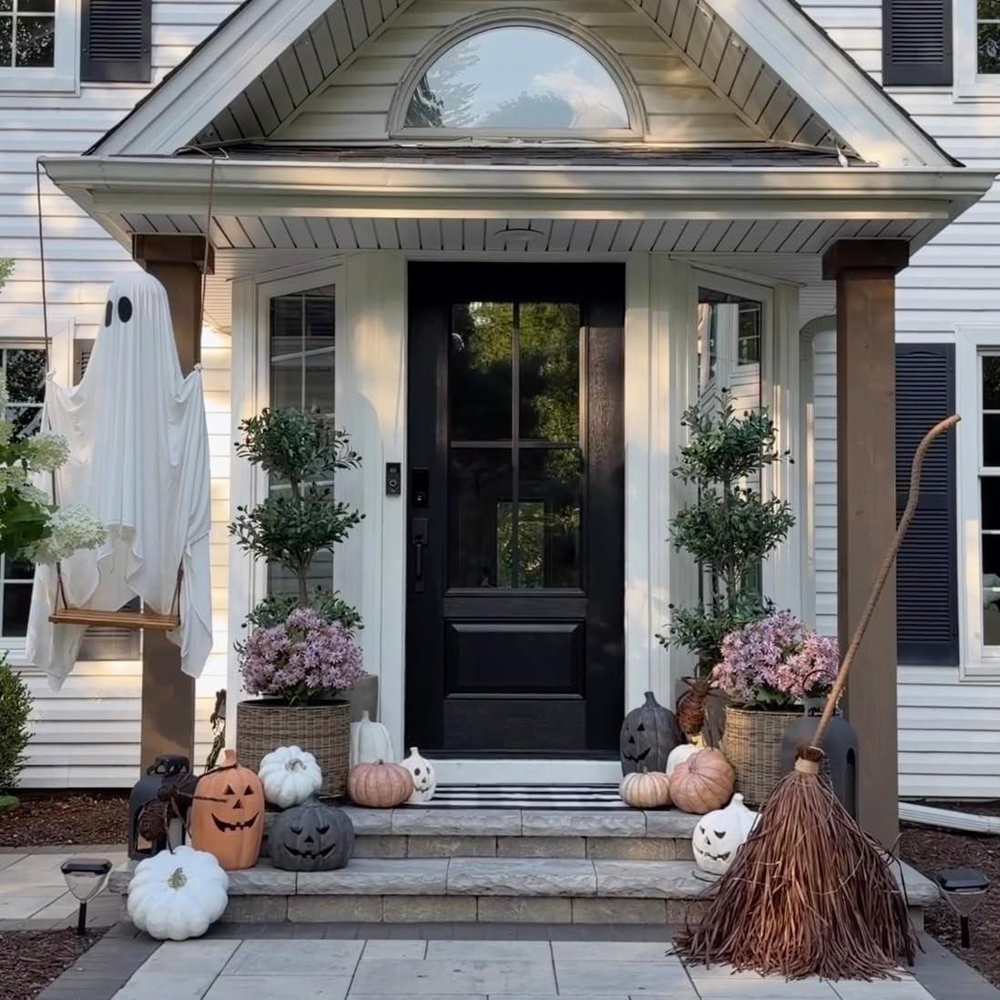 Gorgeous and zero maintenance front porch! Mixing in fall with some Halloween touches!

#LTKHome