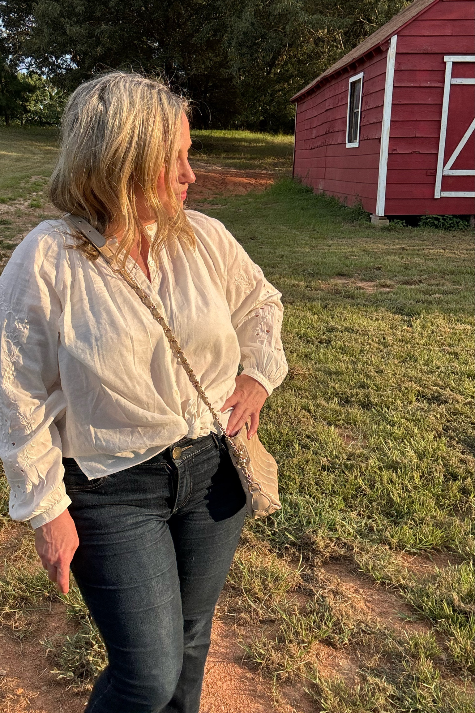 The eyelet detail is so pretty on this flowy top! Perfect country music outfit piece! 

#LTKOver40 #LTKSeasonal #LTKTravel