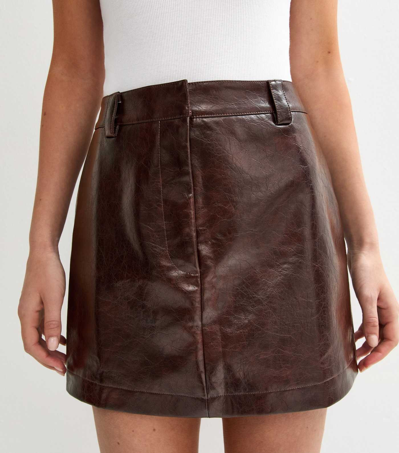 Dark Brown Cracked Effect Faux Leather Mini Skirt | New Look | New Look (UK)